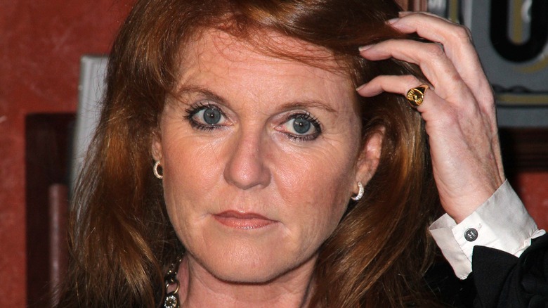 Sarah Ferguson touching her hair