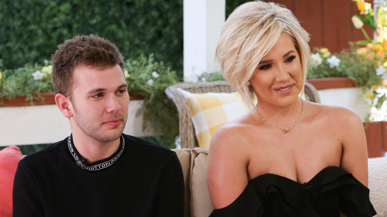 Savannah and Chase Chrisley on sofa