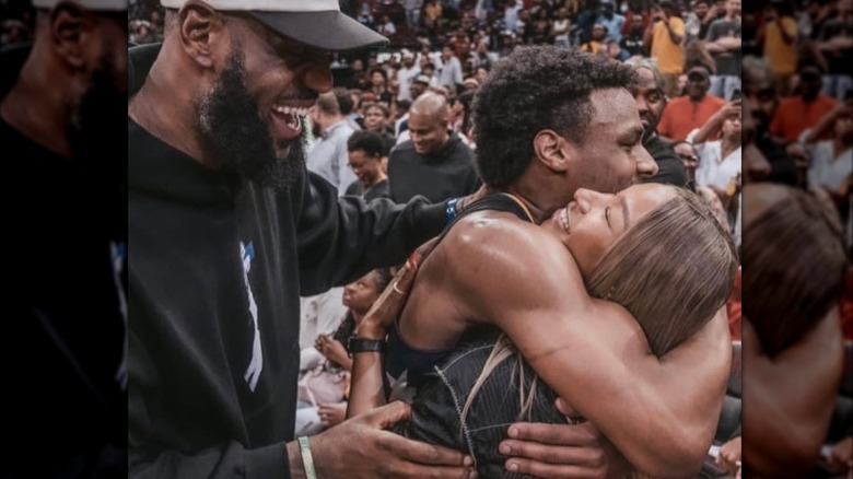 Bronny James hugging Savannah James