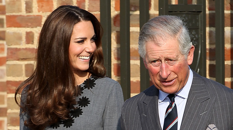 Kate Middleton laughing with King Charles