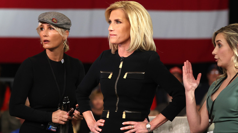 Laura Ingraham stands with her hands on her hips.