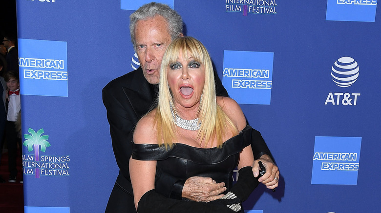 Alan Hamel and Suzanne Somers with shocked expression