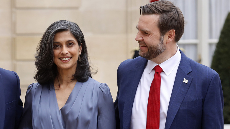 Usha Vance smiles at the camera as JD Vance chats to the Macrons.