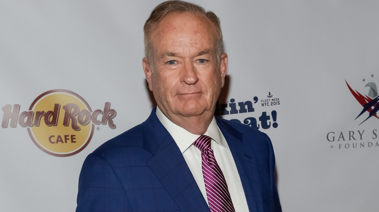 Bill O'Reilly posing in suit