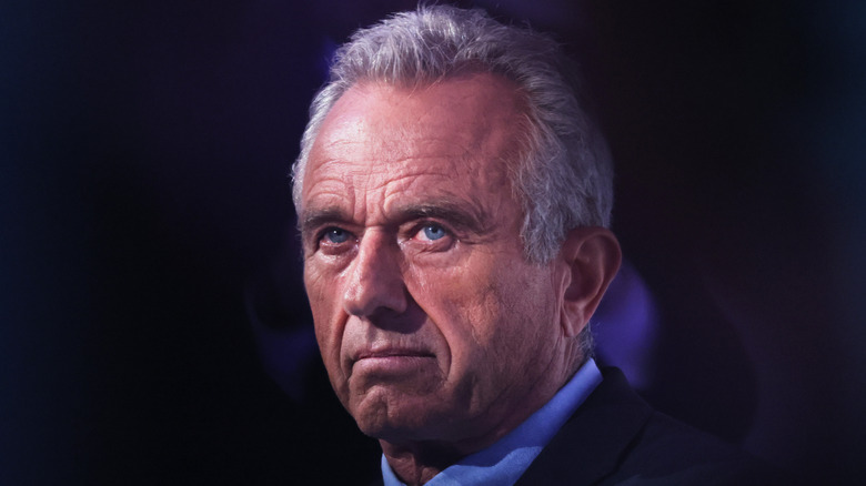 Robert F. Kennedy Jr. against dark background