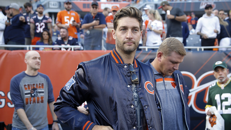 Former Chicago Bears player Jay Cutler standing on sidelines