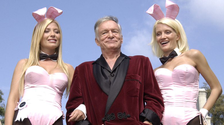 Hugh Hefner with bunny women