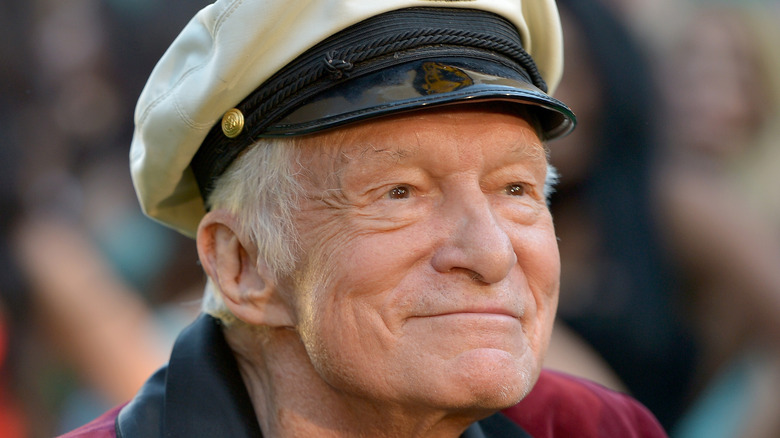 Hugh Hefner wearing sailor hat