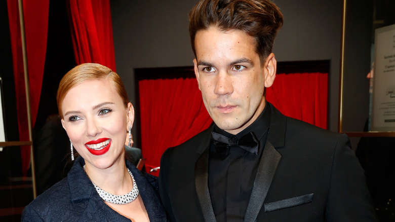 Scarlett Johansson and Romain Dauriac posing