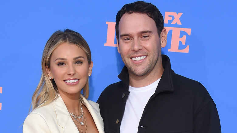 Yael Cohen, Scooter Braun smile on the red carpet