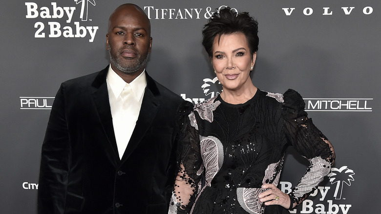 Corey Gamble and Kris Jenner pose in 2022