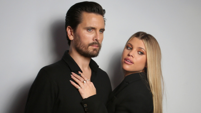 Scott Disick and Sofia Richie pose in black