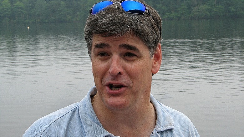 Sean Hannity speaking near lake