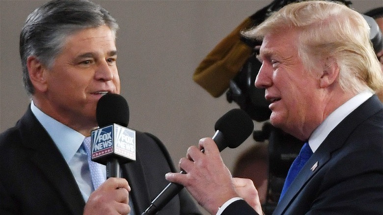 Sean Hannity, Donald Trump with microphones