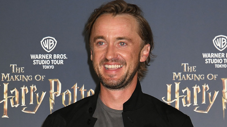 Tom Felton smiling