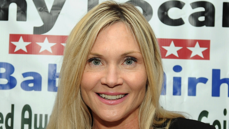 Amy Locane smiling