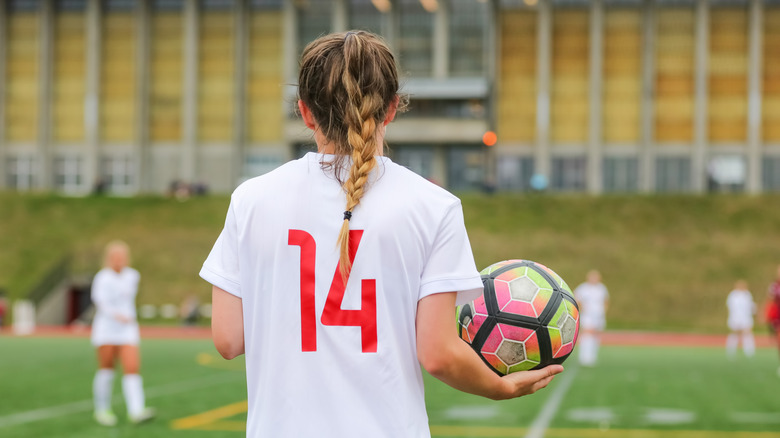 Back of girl soccer player 