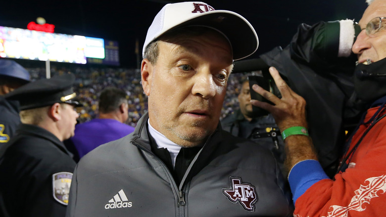 Jimbo Fisher at Texas A&M game looking down