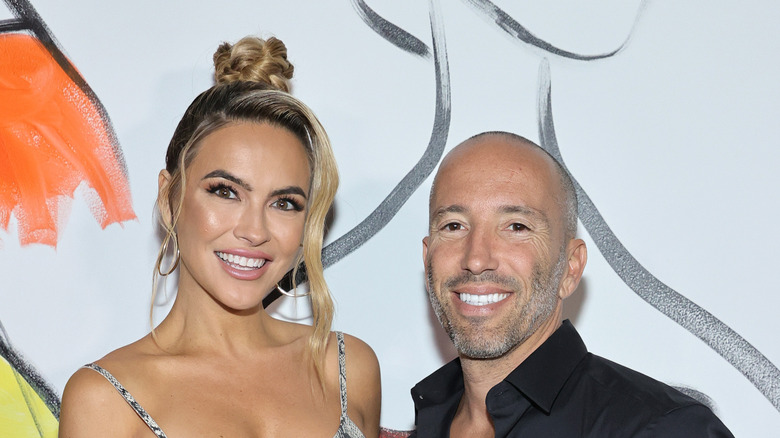 Chrishell Stause and Jason Oppenheim attend alice + olivia New York Fashion Week 2021