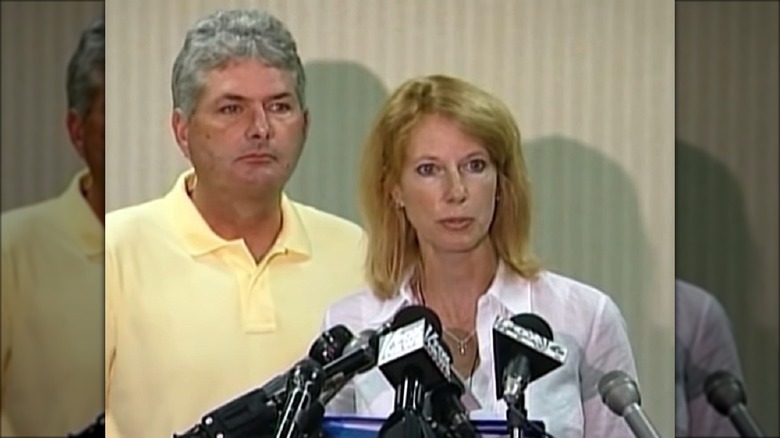 Beth Holloway and George Twitty at a press conference