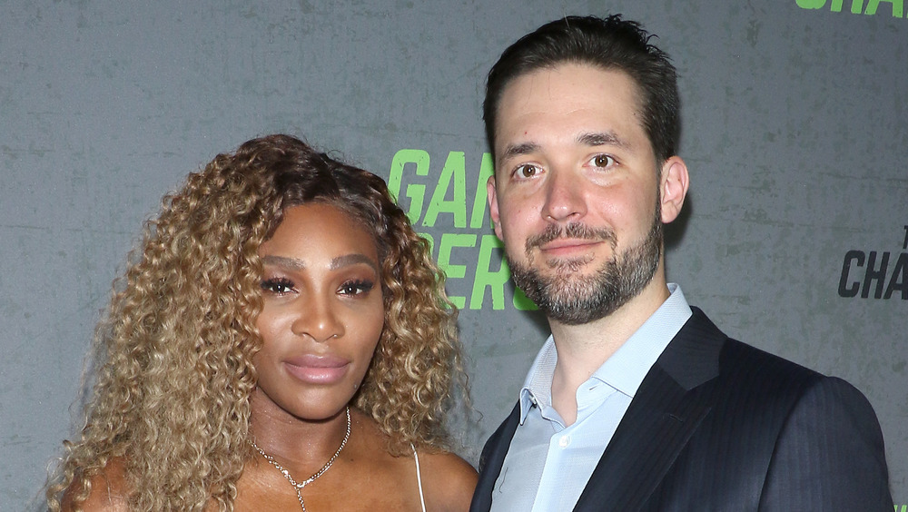 Serena Williams and Alexis Ohanian Sr. smiling slightly