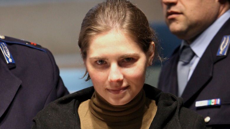 Amanda Knox smirking 