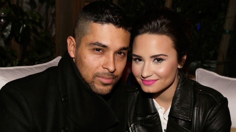 Wilmer Valderrama, Demi Lovato smiling