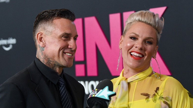 Carey Hart and P!nk, both laughing