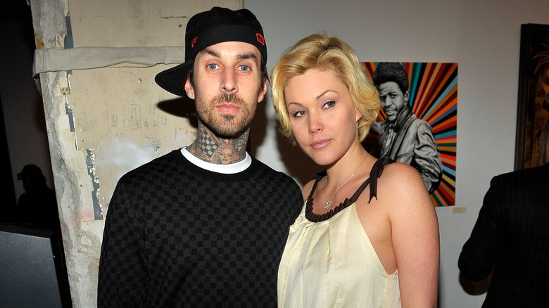 Travis Barker and Shanna Moakler smiling