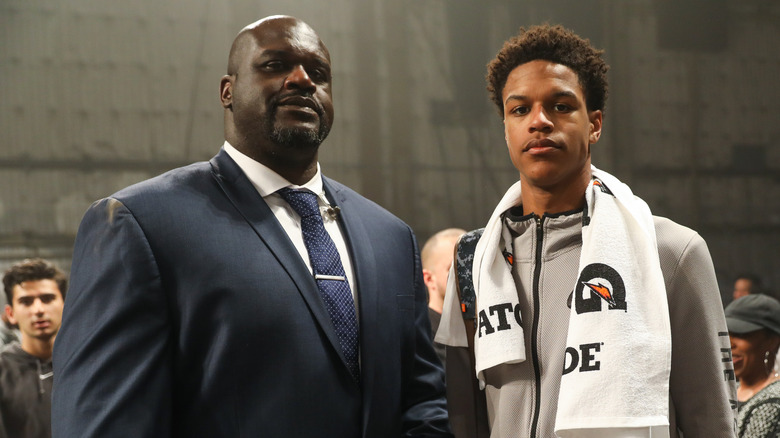 Shaquille and Shareef O'Neal posing