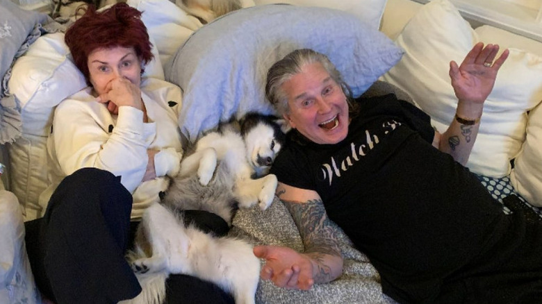 Sharon and Ozzy Osbourne with dog