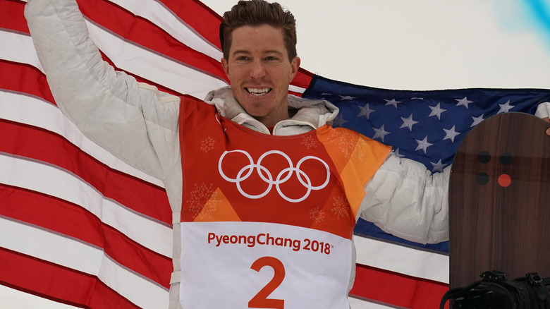 Shaun White holding American flag