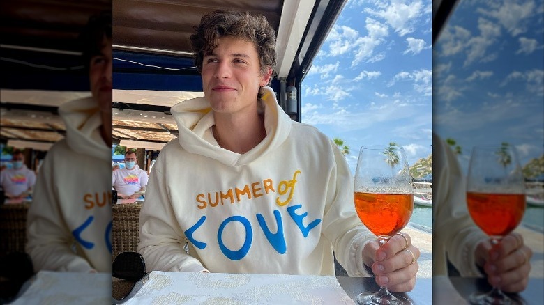 Shawn Mendes with drink