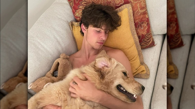 Shawn Mendes cuddling dog