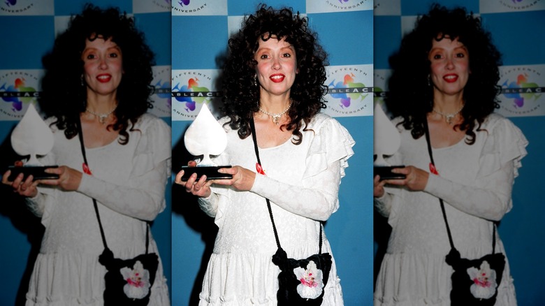 Shelley Duvall holding award