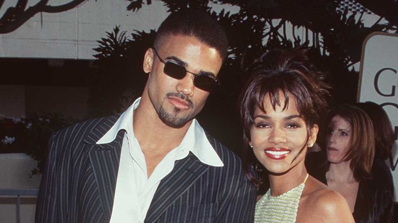 Shemar Moore and Halle Berry posing