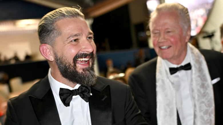 Shia LaBeouf laughing with Jon Voight