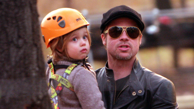 Shiloh Jolie-Pitt with Brad Pitt