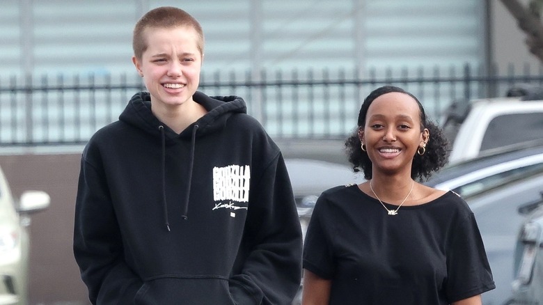 Shiloh Jolie-Pitt and Zahara Jolie-Pitt smiling