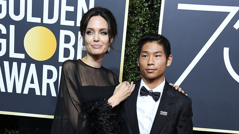 Angelina Jolie and Pax Jolie-Pitt posing