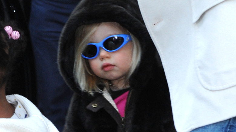 Shiloh Jolie-Pitt wearing sunglasses