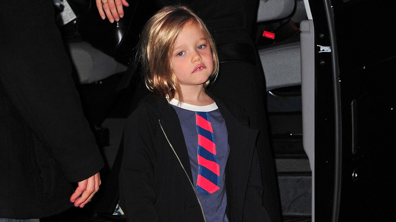 Shiloh Jolie-Pitt wearing tie t-shirt