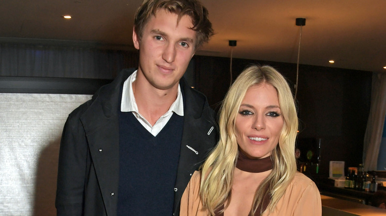 Sienna Miller and Lucas Zwirner pose together