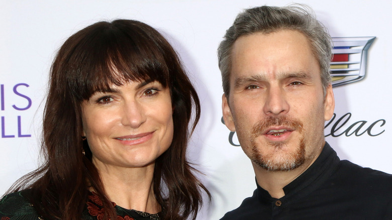 Rosetta Getty and Balthazar Getty smiling