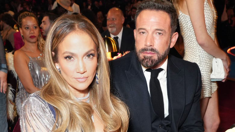 Jennifer Lopez and Ben Affleck sitting