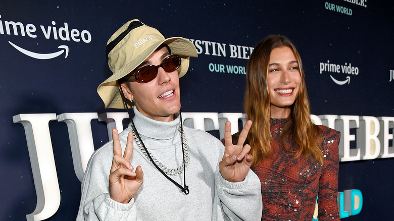 Justin and Hailey Bieber posing