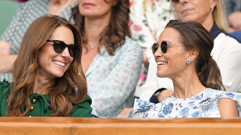 Kate, Pippa Middleton smiling