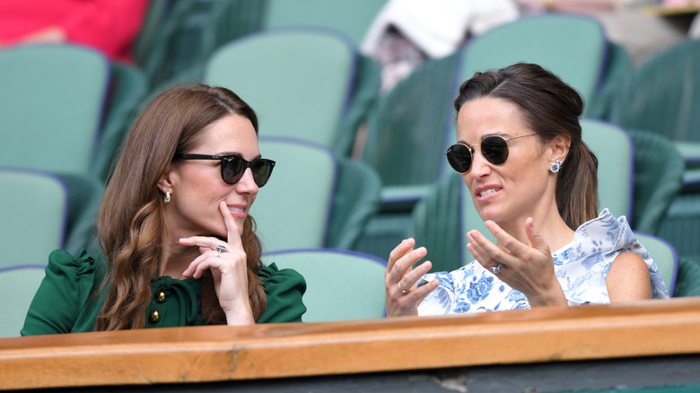 Kate, Pippa Middleton talking