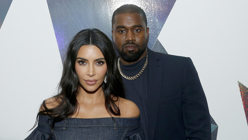 Kim Kardashian West and Kanye West looking glum 