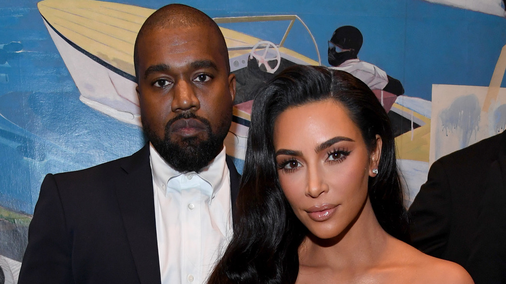 Kanye West and Kim Kardashian not smiling 